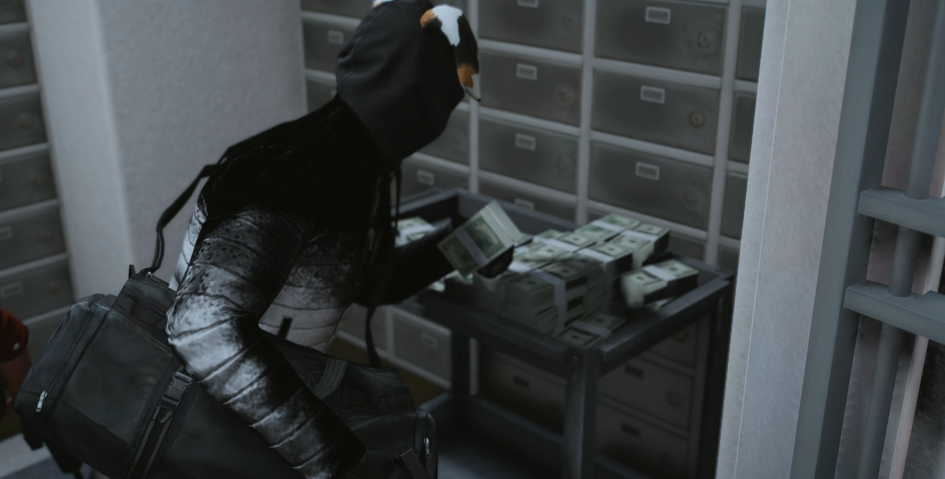 A masked robber grabbing cash in a vault